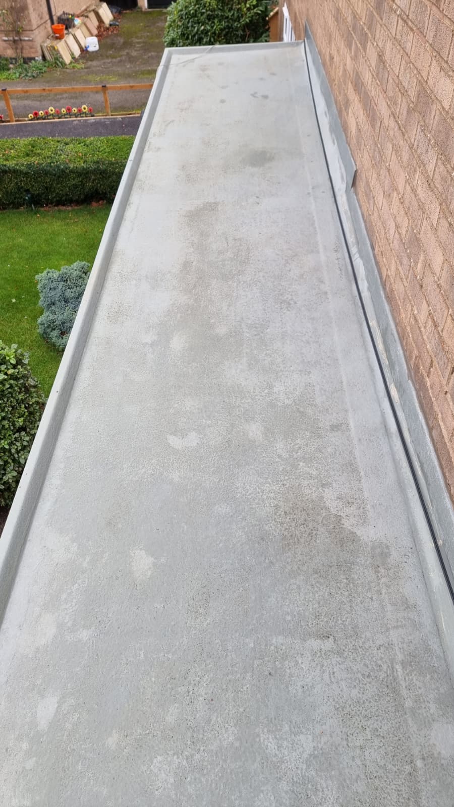 Roofing project showing new felt and edging