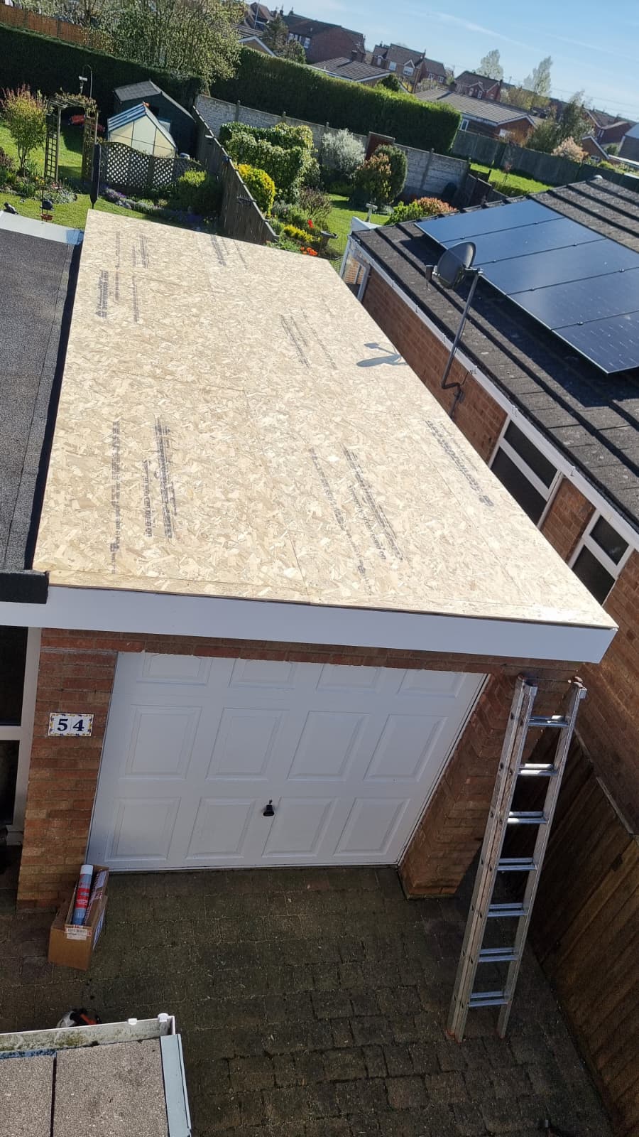 Flat roof completion with clean edges and trim