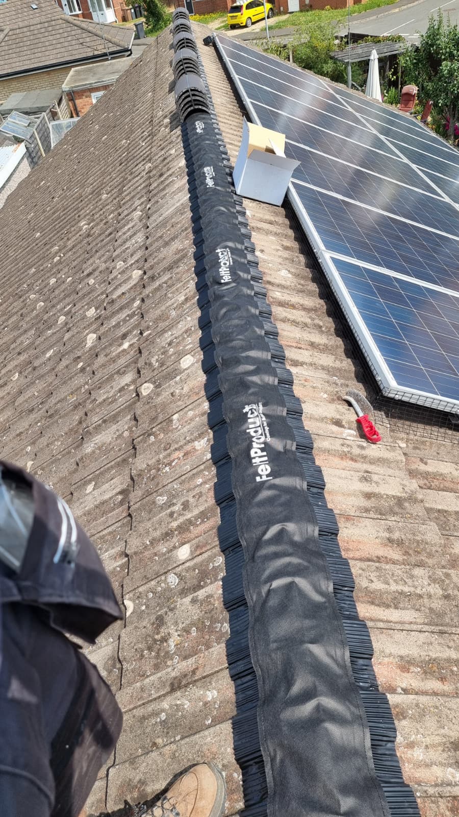 FeltProducts ridge roll membrane fitted along roof apex