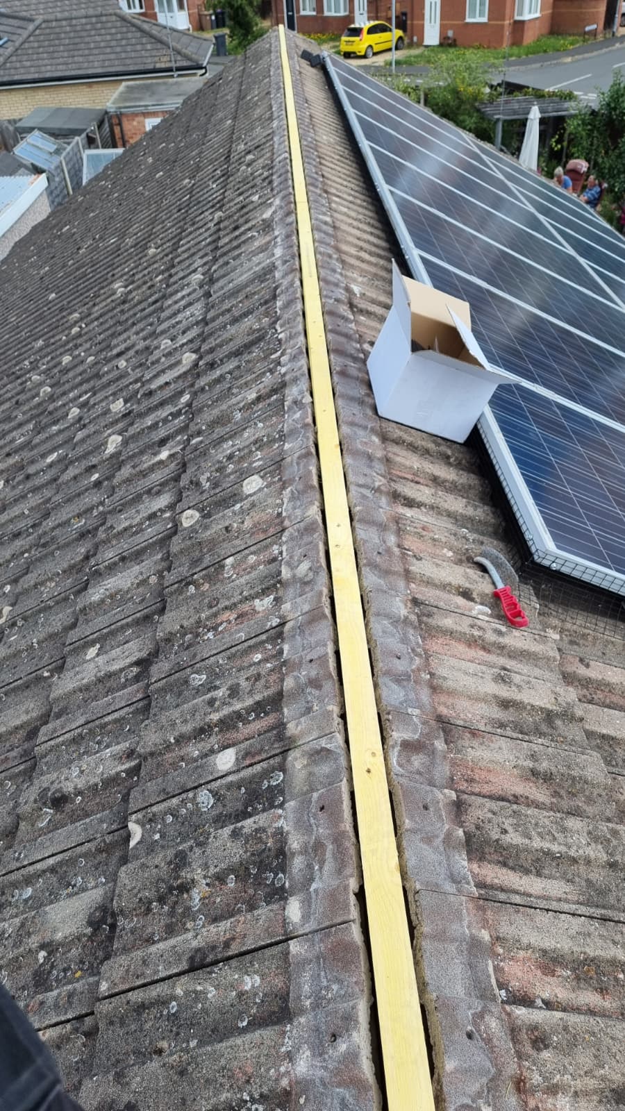 Ridge batten with tools and drill ready for dry-fix work