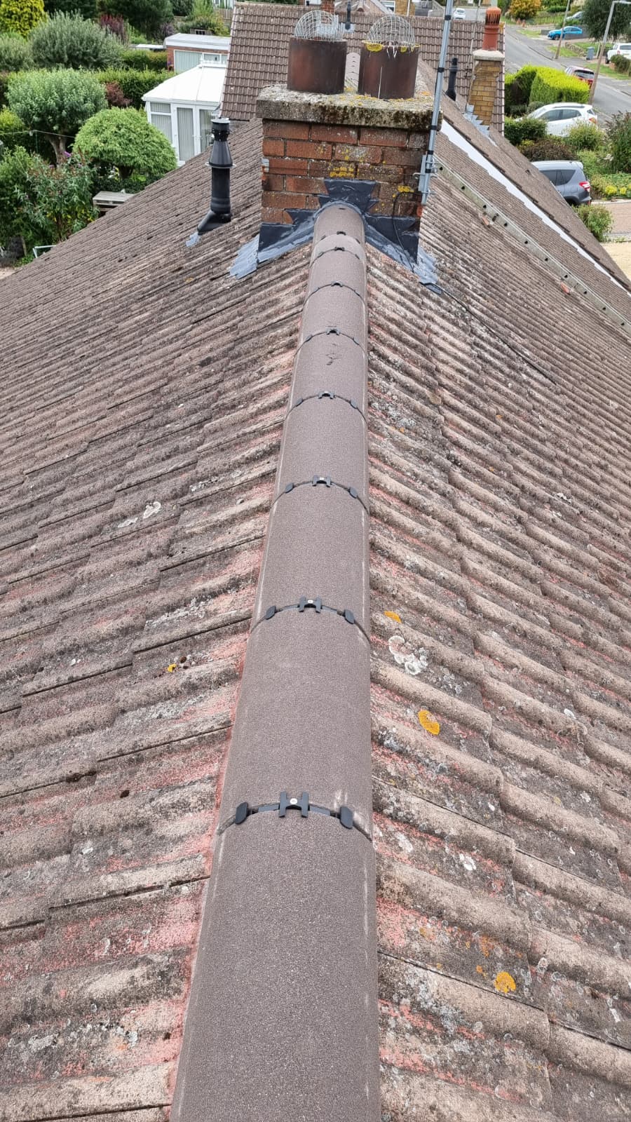 Chimney stack with new dry ridge tiles and lead work