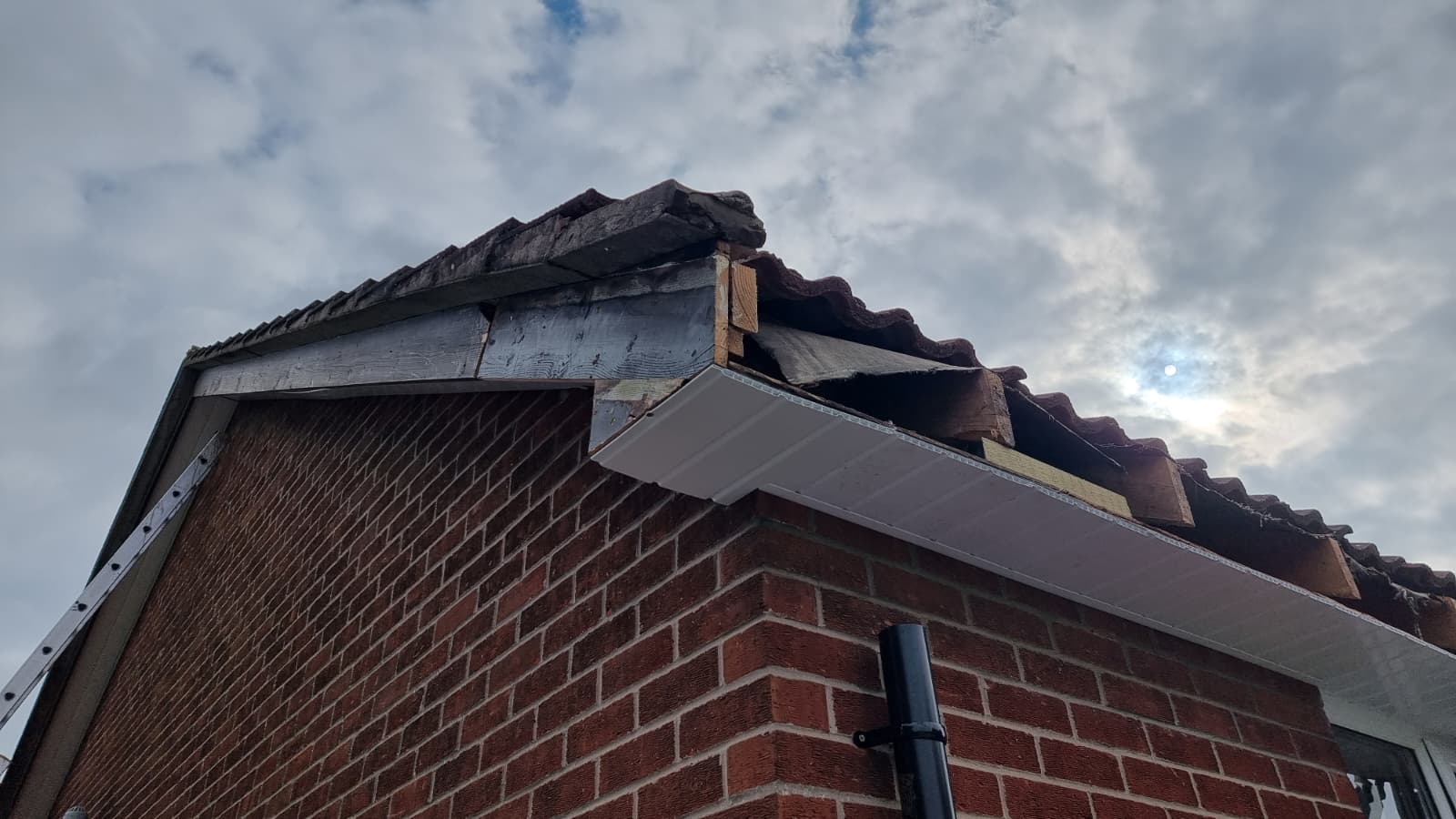 Brown cladding and dry verge fitted to garage gable