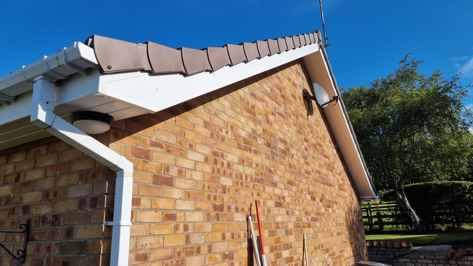 Roof edge showing new felt and tile work